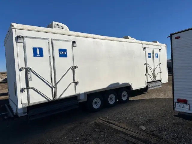 Portable restroom trailer rental unit